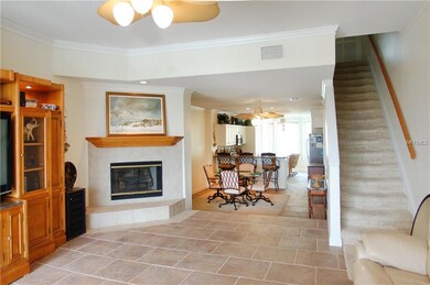 Wood-burning fireplace in open but defined living 