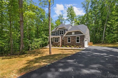 Craftsman-style home featuring a front lawn
