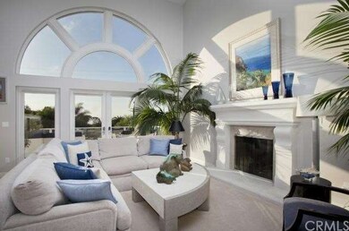 Living room with 20 foot ceilings, Palladium windo