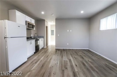 Kitchen featuring stainless steel appliances, whit