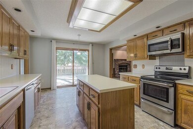 Kitchen has lots of cabinets.