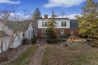 Back of home, brick patio