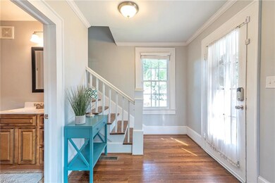 Hardwoods in the Foyer as well as hardwood stair treads.