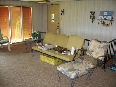 Sun Porch coming from Lower Level with access to c