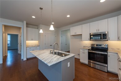 Photos are of a Belmont Plan built in a similar co
