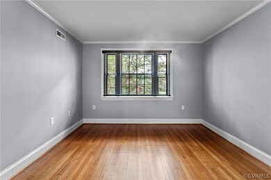 Spare room featuring hardwood / wood-style floors