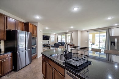 Kitchen with appliances with stainless steel finis