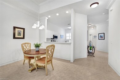 Dining area with crown molding.