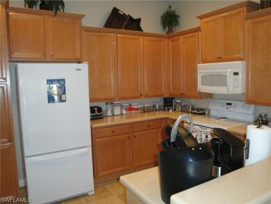 Kitchen features all new appliances and Corian cou