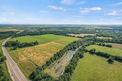 Overview of rural landscape featuring a main thor