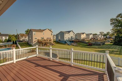 Large fenced backyard backs to commons.