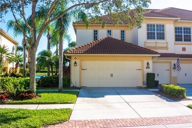 Front of Unit with wide driveway
