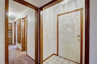 Entry way + Hallway to Bathroom and Bedrooms