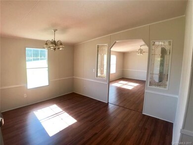 Dinning area off of kitchen and connected to both 