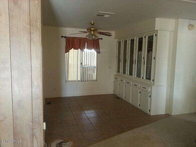 dining room with tile floors & cabinets