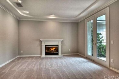 Formal Living room with fireplace and French doors