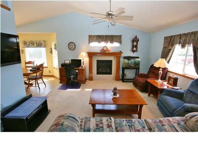 Ceiling fans, vaulted ceilings, and fireplace!