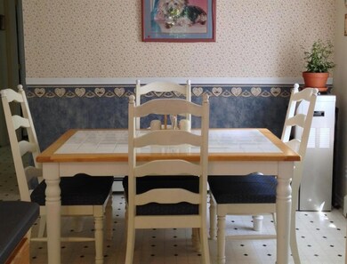 Dining area off to one side of kitchen