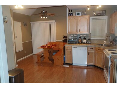 Vaulted Dining area. Back slider door steps out to