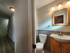 Powder room finished out in a very chic style.