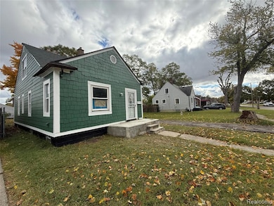 View of property exterior with a yard and a chimney