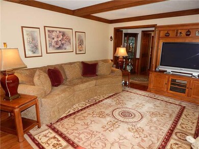 Family Room. Neutral tones are found throughout.