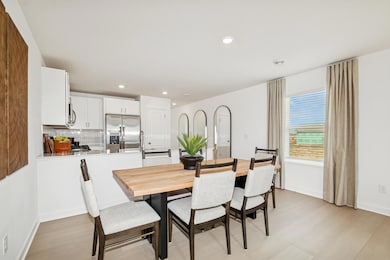 (*Photo of actual model home) The perfect space for meals with loved ones