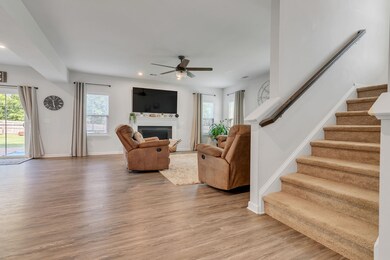 From the foyer lead to open floorplan and stair way to bedrooms.