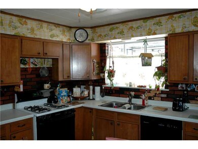 Kitchen. Kitchen has a lot of cabinet and counter 