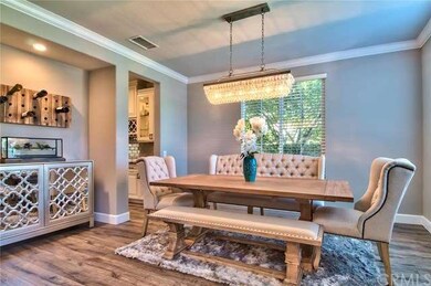 Formal Dining Room with Recessed Lighting and a Up