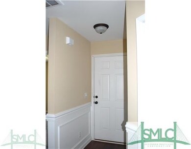 Foyer. Photos are of the same plan previously cons