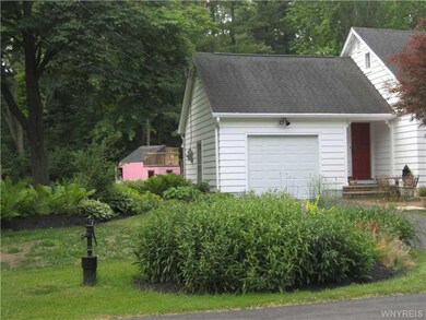 Exterior Front. Beautiful gardens