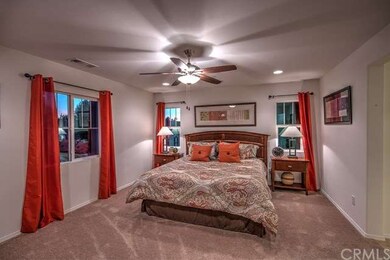 Photo of model home master bedroom, photo not inte