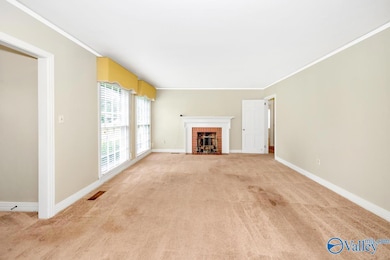 Carpet, Fireplace, crown molding