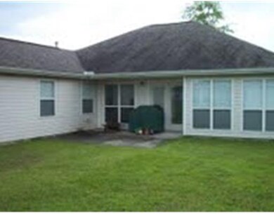 Exterior Back. Larger Open with Covered Patio