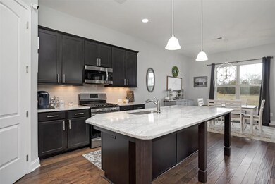 Everything you could dream of luxury cabinets, stainless gas stove, stunning granite, large pantry and more.