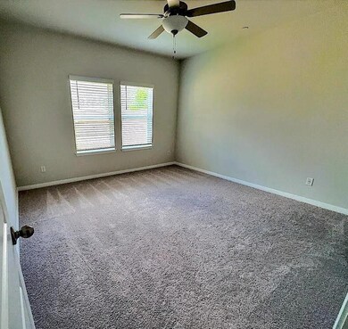 Unfurnished room with carpet floors, baseboards, 