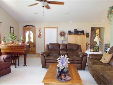 Living Room. The vaulted ceilings add to the spaci