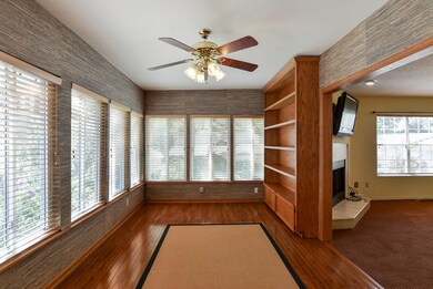 Beautiful Sunroom with Built-Ins!