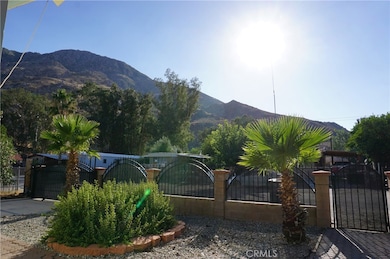 Photograph taken facing West from front of property in the afternoon.