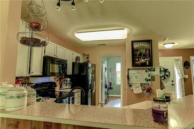 Kitchen features new flooring, 3 year old dishwash