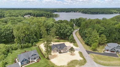Drone / aerial view of a heavily wooded area and a