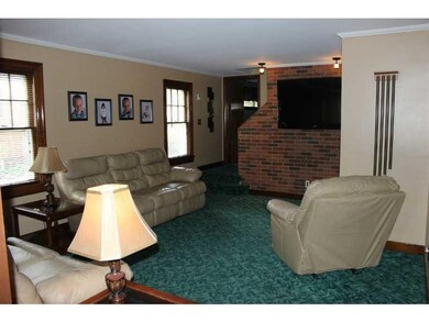 Living Room. Beautiful brick accent wall