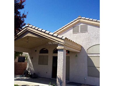 Exterior Back. Covered patio