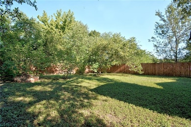 View of fenced backyard