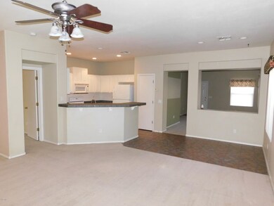 family room view to kitchen