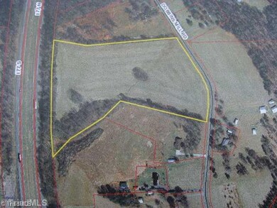 Land. 2 Acres of woodland and the balance (11) Acres in level open hayfields.  Total of 13+or- Acres