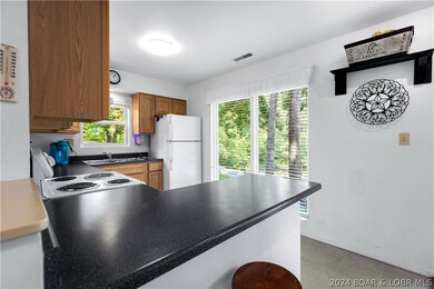 1547 Robin Hood Ln, Roach, MO 65787 - photo 7