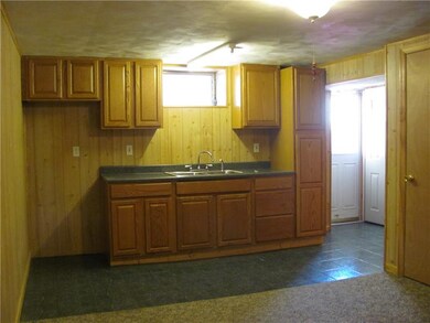 2nd kitchen in basement next to game room.