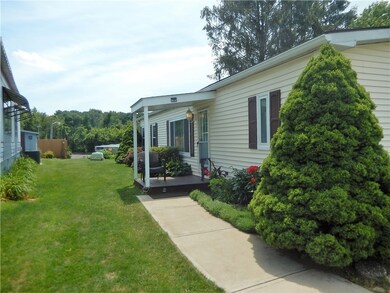 This spacious double-wide mobile home has been bea